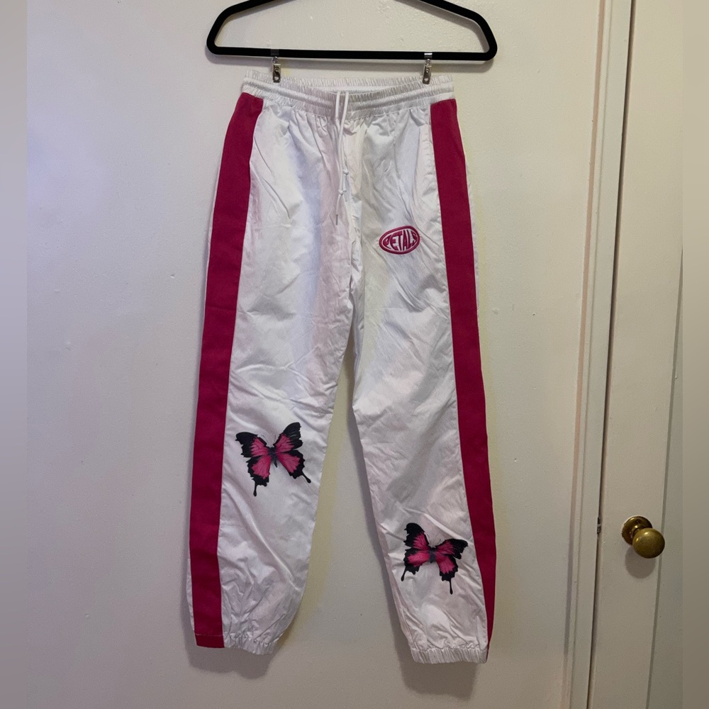 Petals and peacocks white track pants